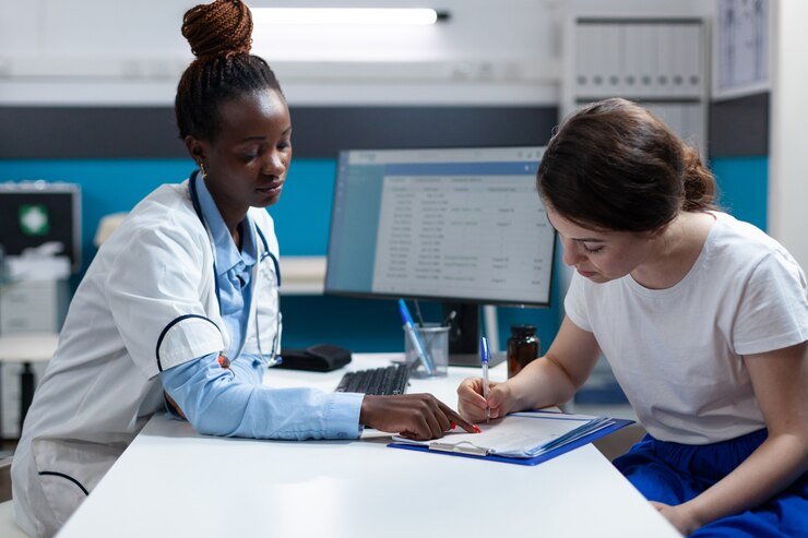 woman-patient-signing-medical-documents-discussing-medication-treatment_482257-23033